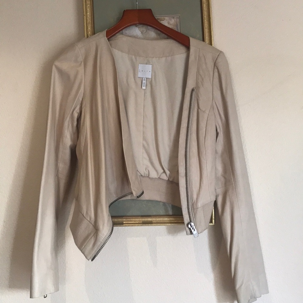 100% leather jacket, cream size M.